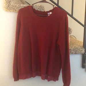 Red sweater with detailed back
